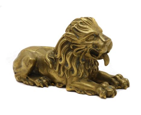 A bronze of a lion, 20th century, modelled in a recumbent position, unsigned, 18cm wideCondition report: With spots of patina
