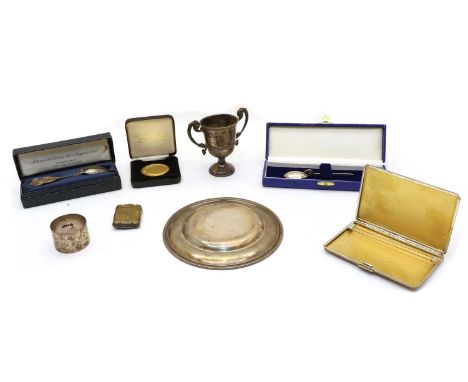 A collection of silver items, to include a trophy by Adie Brothers Ltd, Birmingham 1924, an engine turned cigarette case, by 