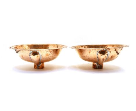 A pair of hammered copper basins, 20th century, 41cm diameter, 20cm deepCondition report: Light scratches, overall good order