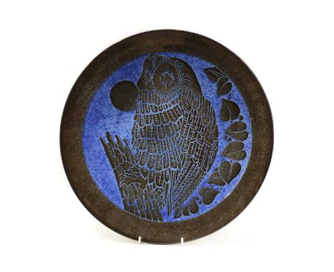 A Poole Aegean 'Blue Moon Owl' charger, decorated by Leslie Elden, with a brown and blue ground, with artist's monogram, numb
