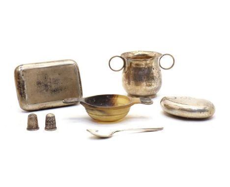 A Victorian silver pocket tobacco box, by Nathanial Mills, Birmingham 1852, of plain curved, rectangular form, the cover engr