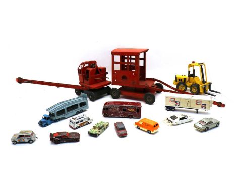 A collection of vintage Dinky, Corgi and Britains toys, comprising a car transporter, 982, an Express Horse Box, a Corgi 007 