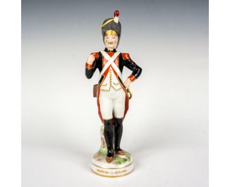Hand painted figure of a uniformed officer in red and black coloration with gilded accents. Porcelaine De France backstamp. D