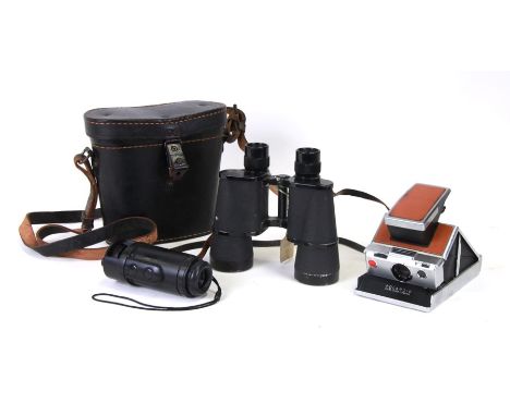 A vintage Polaroid SX-70 Land Camera; together with a pair of 7x50 binoculars, cased; a Helios - O2 scope (3).Condition Repor