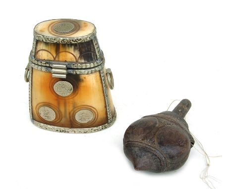 A horn powder flask with white metal mounts, 9.5cms high; together with a similar carved wooden example (2).