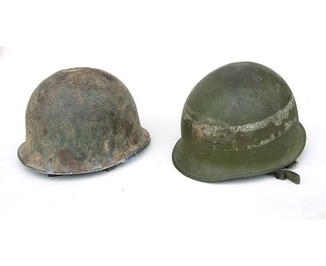 A French Army M51 helmet made by S.A.U.F. of Paris in 1953 for the first Indochina War with an American helmet liner, togethe