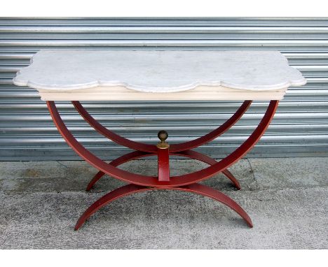 A bespoke shaped marble and steel garden console table. 123cm wideCondition Report56cm deep, 73cm high some chipping to the m