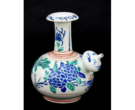 A late 17th century Japanese Kakiemon Kendi (pouring vessel) decorated in polychrome enamels, 20cms high.Condition ReportVery