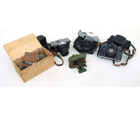 Two ZENIT 35mm cameras together with a PRAKTICA 35mm camera with various vintage scientific and electrical instruments