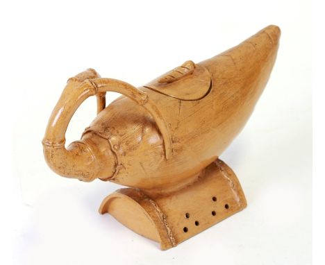 A Chinese Yixing teapot and cover in the form of a bamboo shoot, 20cms wide.