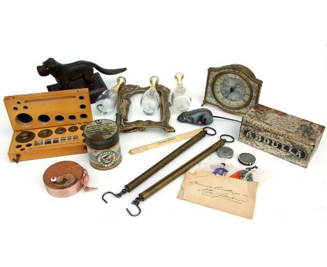 A Japanese tin plate clockwork mouse, an Art Nouveau style brass picture frame; boxed weights, a cast nut cracker,; a mantle 