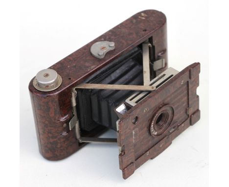 A Kodak No. 2 Hawkette Bakelite folding camera, 18cms high.