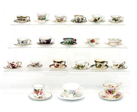 A large quantity of miniature cups and saucers to include Masons, Coalport and Wedgwood.
