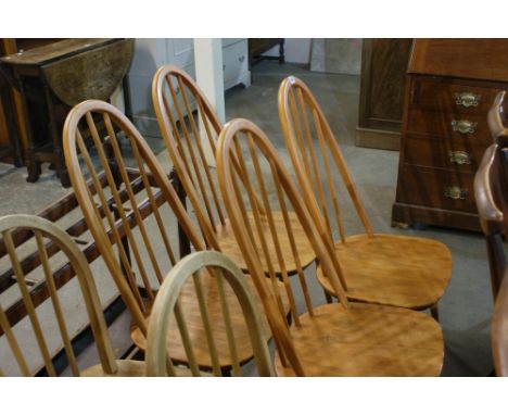 A Set Of Four Ercol High Back Stick Back Chairs