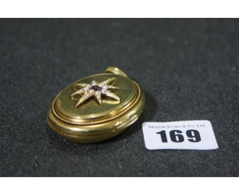A Victorian Seed Pearl And Ruby Set Gold Locket Of Oval Form, 30 Gm All In