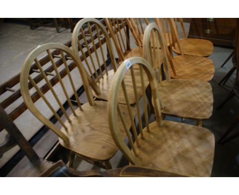 A Set Of Four Ercol Stick Back Chairs