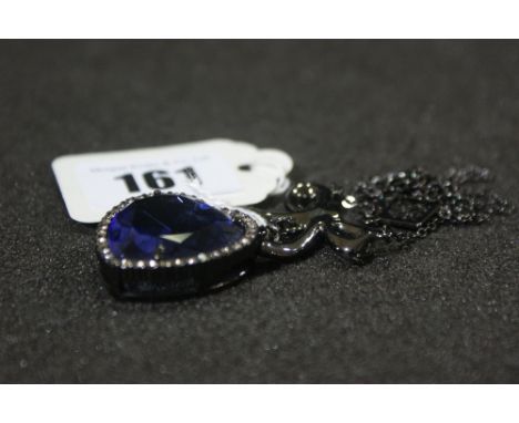 An Amethyst Colour Heart Shaped Pendant And Chain