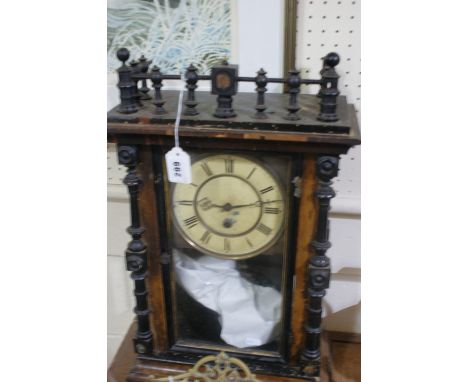 A Pendulum Mantel Clock With Circular Dial