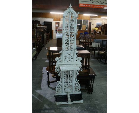 A Cast Iron And Painted Pierced Hallstand With Stick Stand Base