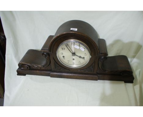 An Edwardian Polished Oak Mantel Clock With Circular Silvered Dial