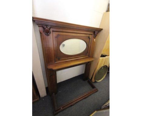 A large Victorian mahogany Fire Surround with overmantle mirror and shelf.