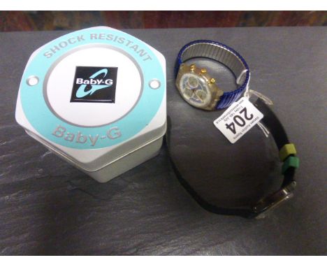 Two collectable Swatch watches and Casio Baby G watch