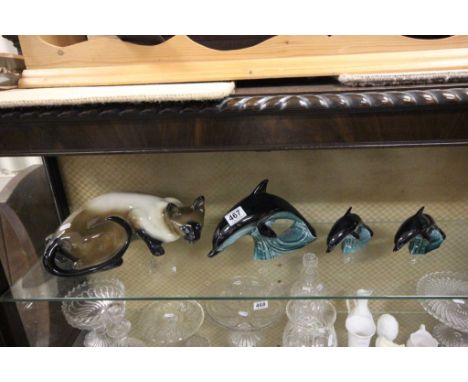 Set of three Poole Dolphins plus Ceramic copper craft Siamese cat