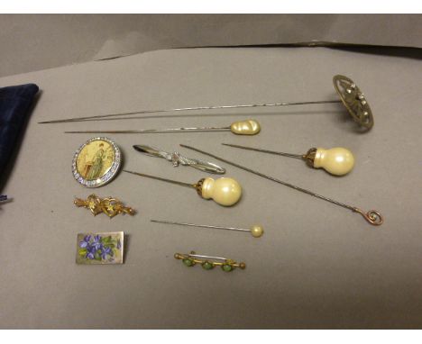Collection of hatpins & brooches to include 9ct gold plus silver & enamel