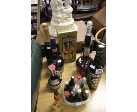 Collection of vintage unopened alcohol to include; Jim Beam Gold Label, Courvoisier V.S, minatures & sparkling wine