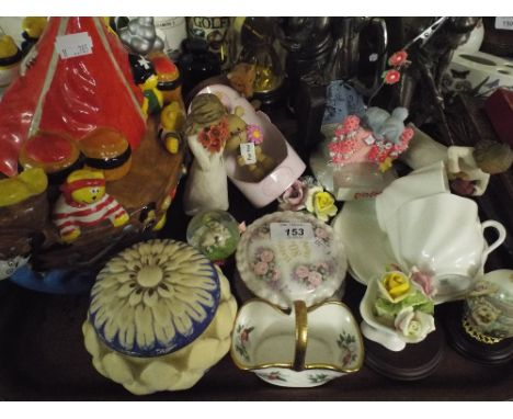 A Tray of Sundries to Include golfing Figural Ornaments Large Ceramic Rayware Biscuit Tin Etc