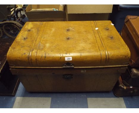 A Painted Tin Trunk.