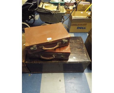 Two Leather Suitcases and A Wooden Trunk.