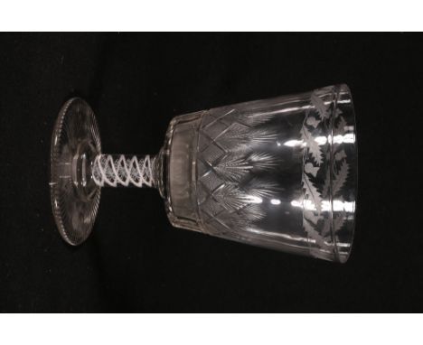 19th century engraved glass rummer with thistle decoration and star cut foot, 22.5cm high CONDITION REPORT: Has a good ring t