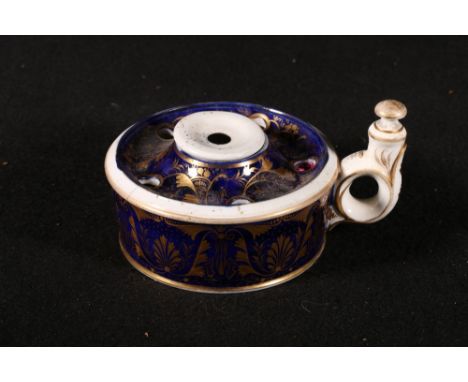 Derby gilt decorated porcelain inkwell of circular form with ring handle and anthemion decoration, red painted mark CONDITION