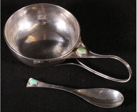 Arts and Crafts Guild of Handicrafts London, shallow bowl in the style of C R Ashbee the slender bifurcated handle with inset