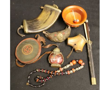 Chinese eating set in a brass bound shagreen holder, a Tibetan decorated crescent shaped snuff mull, a Tibetan horn powder fl