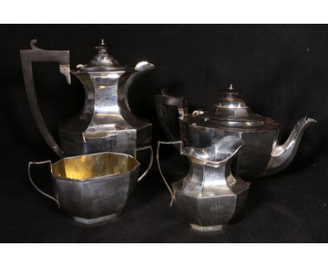Silver four piece teaset of octagonal form, comprising a teapot, hotwater jug and a sugar and cream