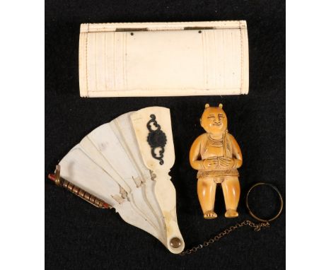 A 19th century Chinese carved ivory figure, an Anglo Indian rectangular carved snuff box 8.5cm, and an ivory fan dance marker