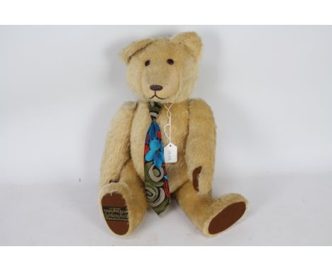 Sonneberg Bear  - A blonde mohair teddy bear with growler by Johanna Haida, The fully jointed bear with glass eyes, brown hor