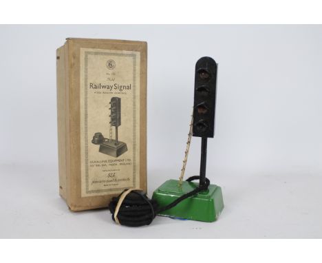 SEL - A boxed 4 light Railway signal lamp with remote control. The lamp shows some signs of age and play use with some corros