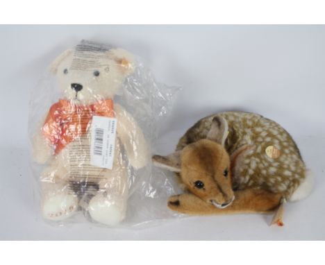 Steiff - Two Steiff plush toys. Lot includes a Steiff  #664625 'Cosy Year Teddy Bear 2015' with yellow label and Steiff butto