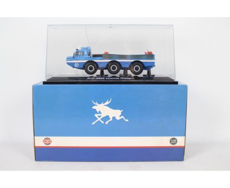 DiP Models - A boxed 1:43 scale DiP Models #249060 Zil 49061 Soyuz Astronaut Rescue Vehicle Blue Bird'. The model appears to 