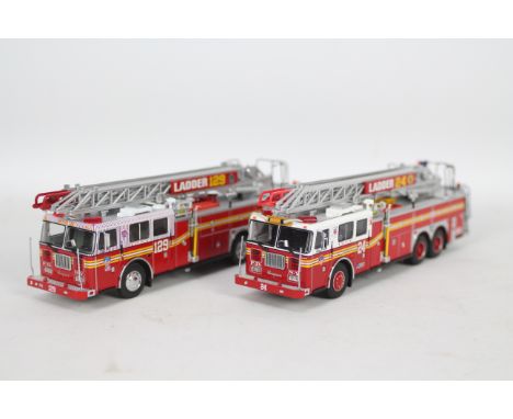 Code 3 Collectibles - 2 x unboxed FDNY Fire Trucks in 1:64 scale, Ladder 24 is a 1999 Seagrave Model J 100 foot Rear Mount La