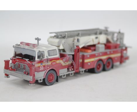 Code 3 Collectibles - An unboxed Mack/Baker 75 foot Ladder in FDNY livery in 1:64 scale. # 13037. It is one of only 2000 prod