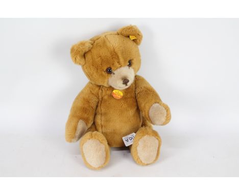 Steiff -  A Steiff #0230/45 'Petsy' jointed blond plush bear with off white muzzle and paws approx 40cms in height, with yell