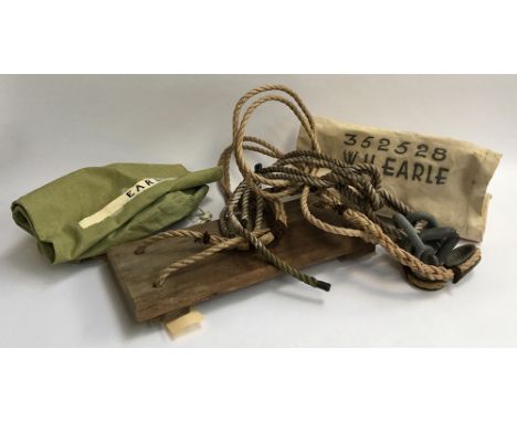 A vintage swing with large galvanised shackle fittings; together with several canvas drawstring bags 