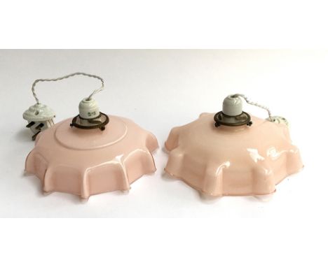 A near pair of 1920s French pink glass ceiling lights with ceramic fitting 