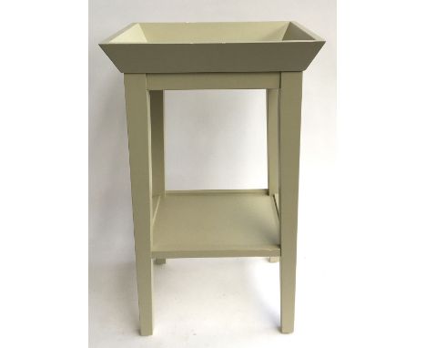 A modern bedside table with outward angled gallery top, painted in Farrow &amp; Ball 'Bone', 71cmH 