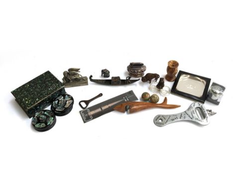 A mixed lot to include a Black Forest bear open salt, 4.5cmH; bottle openers; letter openers; onyx balls; table lighter; moth