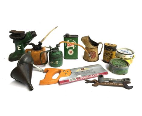 Automobile interest, a quantity of vintage oil cans, tins, funnel, car jack, spanners etc 